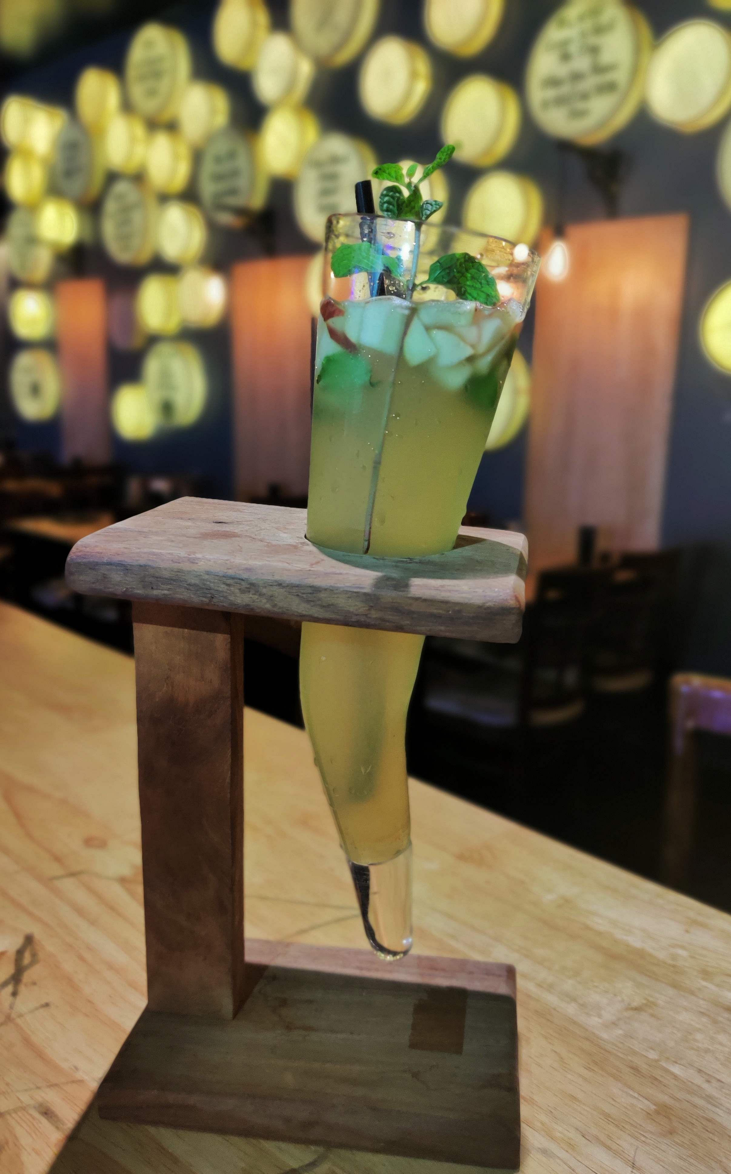 Green,Drink,Table,Distilled beverage,Furniture,Liqueur,Interior design