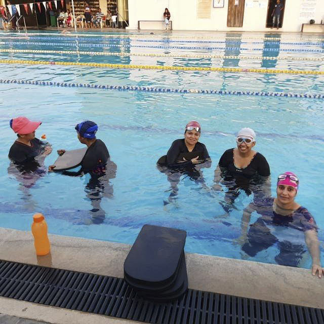 Swimming pool,Swim cap,Leisure centre,Swimming,Water,Swimmer,Leisure,Recreation,Fun,Sports