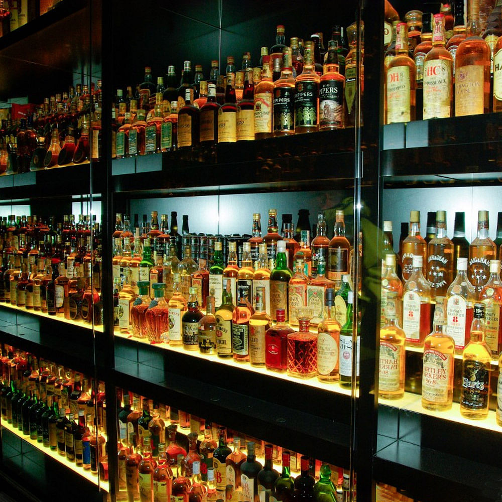 Alcohol,Liquor store,Liqueur,Drinking establishment,Bar,Distilled beverage,Drink,Bottle,Building,Alcoholic beverage