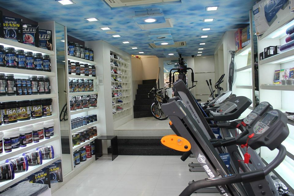 Product,Building,Room,Aisle,Retail,Furniture,Exercise equipment,Shelf,Treadmill,Convenience store