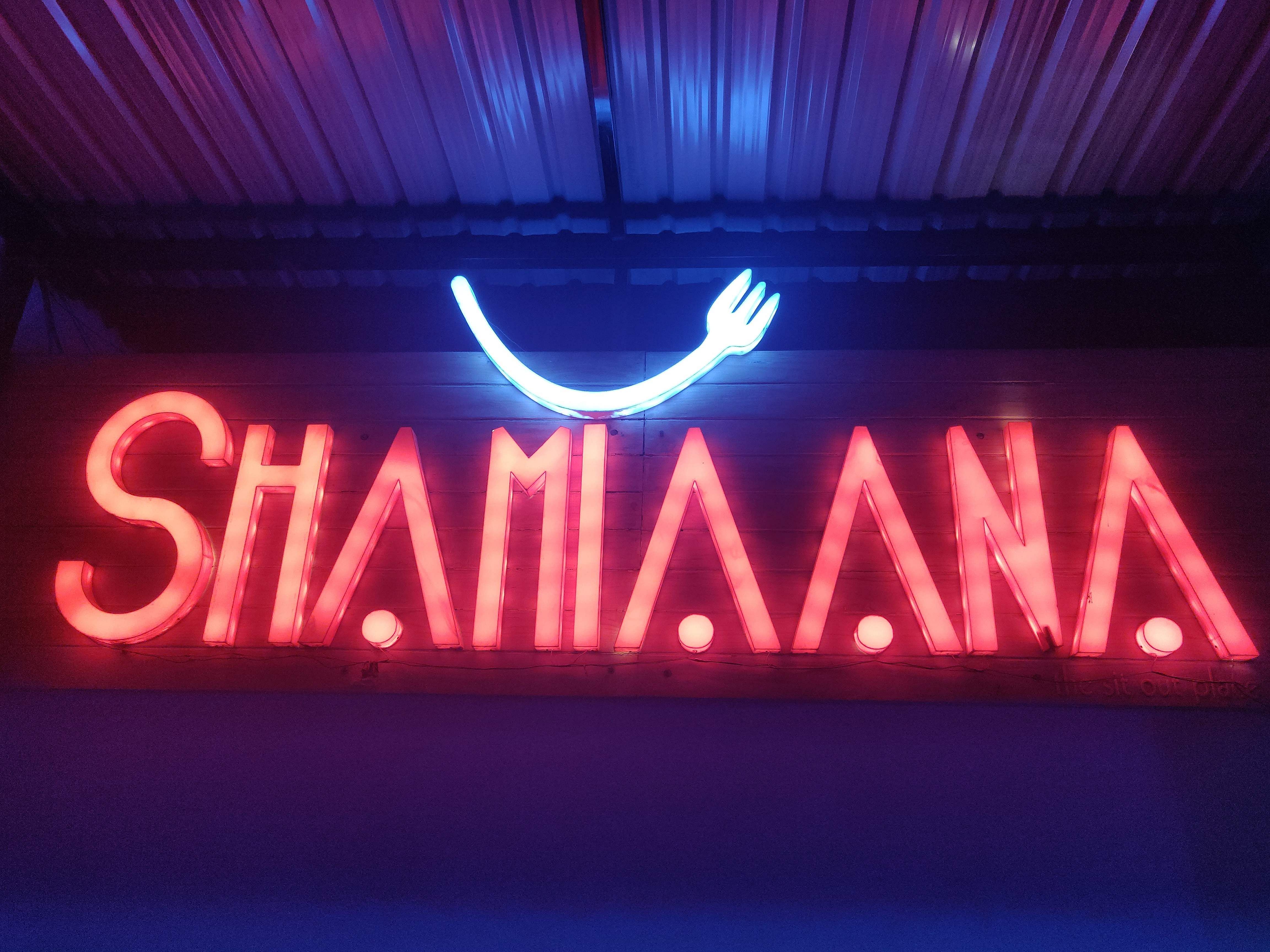 Neon,Neon sign,Electronic signage,Red,Text,Light,Font,Signage,Lighting,Technology
