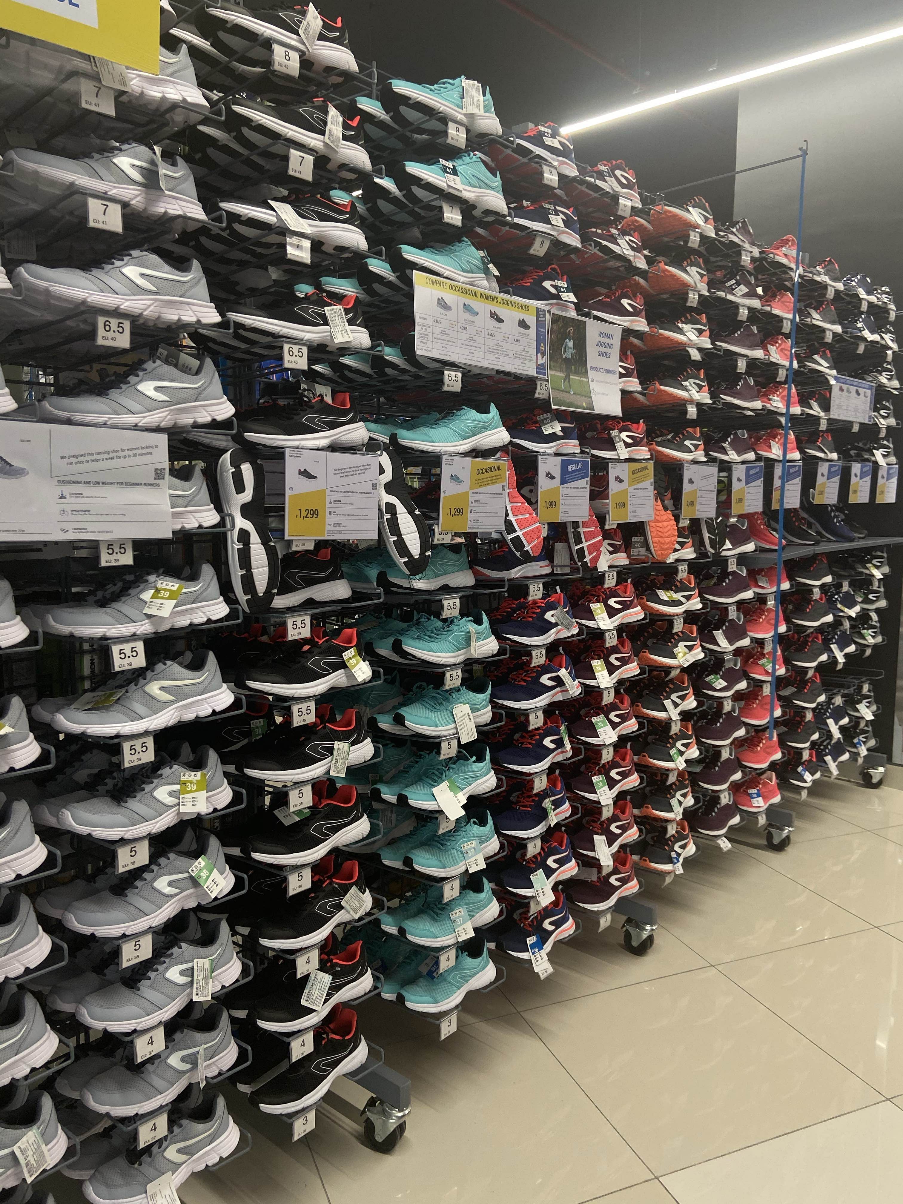 Footwear,Product,Shoe,Inventory,Shelf,Building,Retail,Shoe store,Athletic shoe,Furniture