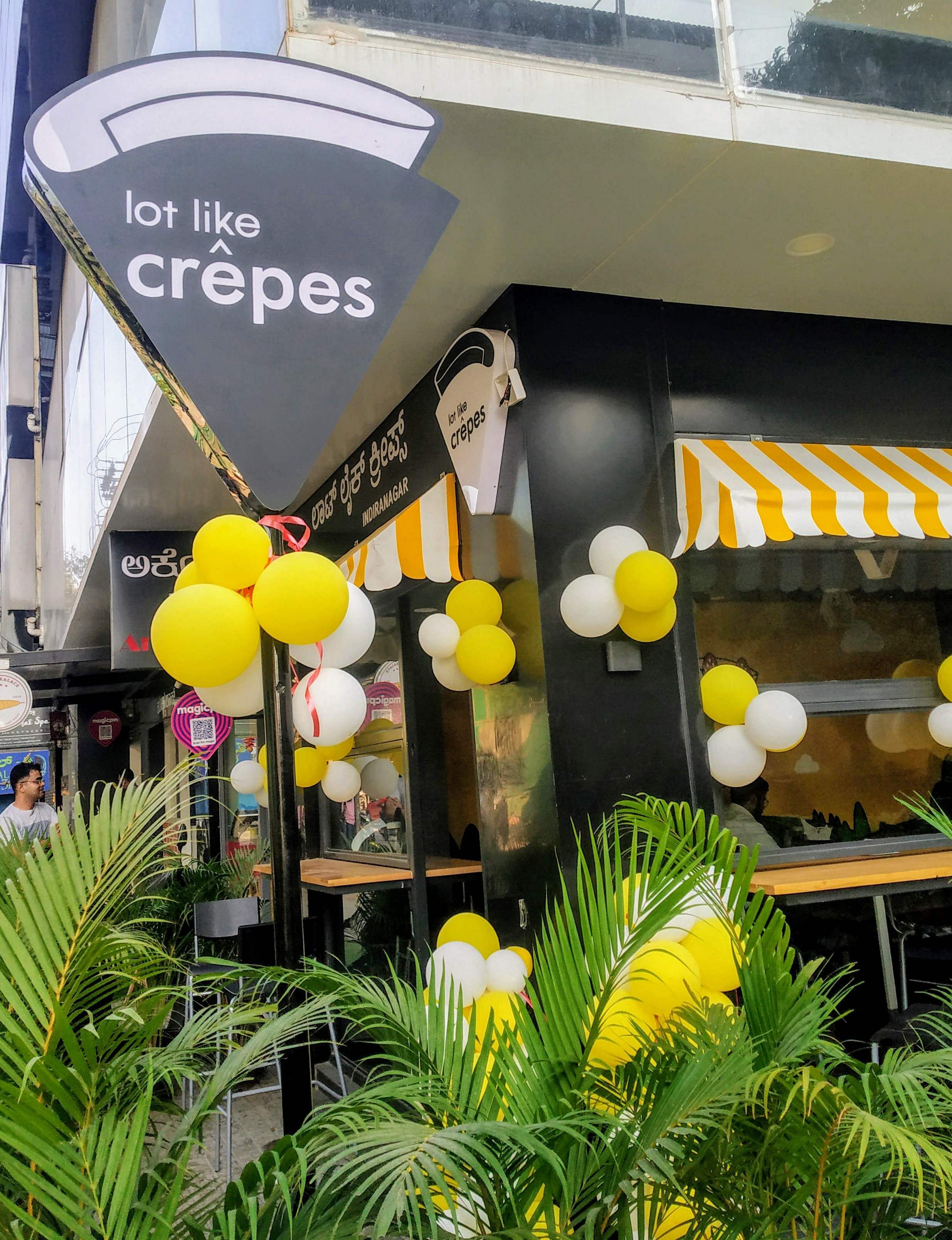 Yellow,Plant,Balloon,Tree,Architecture,Flower,Floristry,Tourism,Building,Restaurant