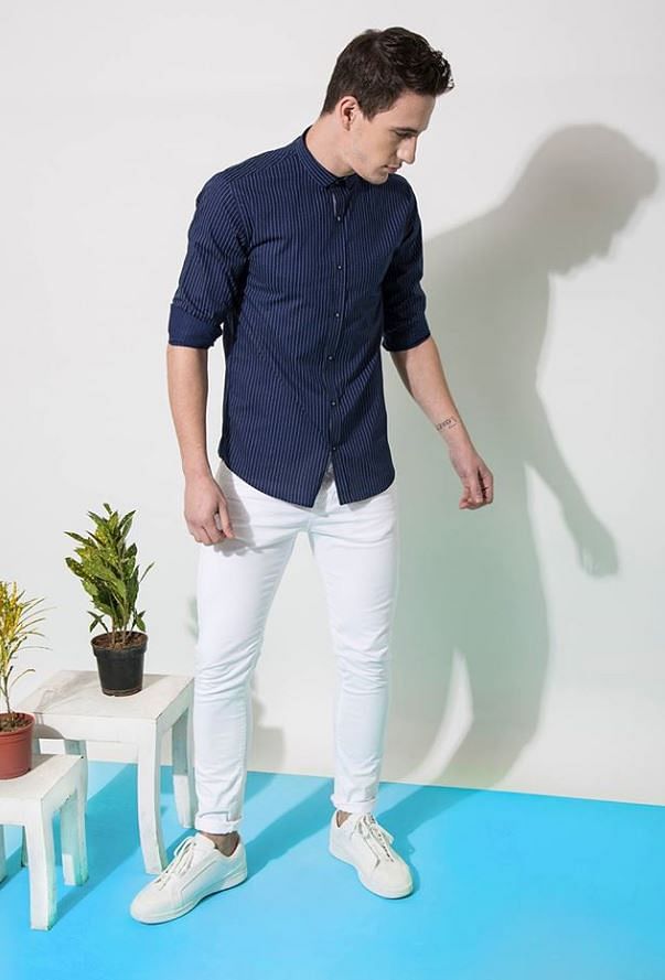 White,Blue,Clothing,Jeans,Standing,Denim,Fashion,T-shirt,Leg,Human