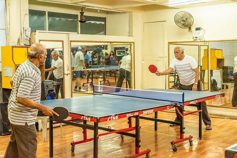 Ping pong,Recreation room,Room,Racquet sport,Table,Sports,Play,Individual sports,Leisure,Indoor games and sports