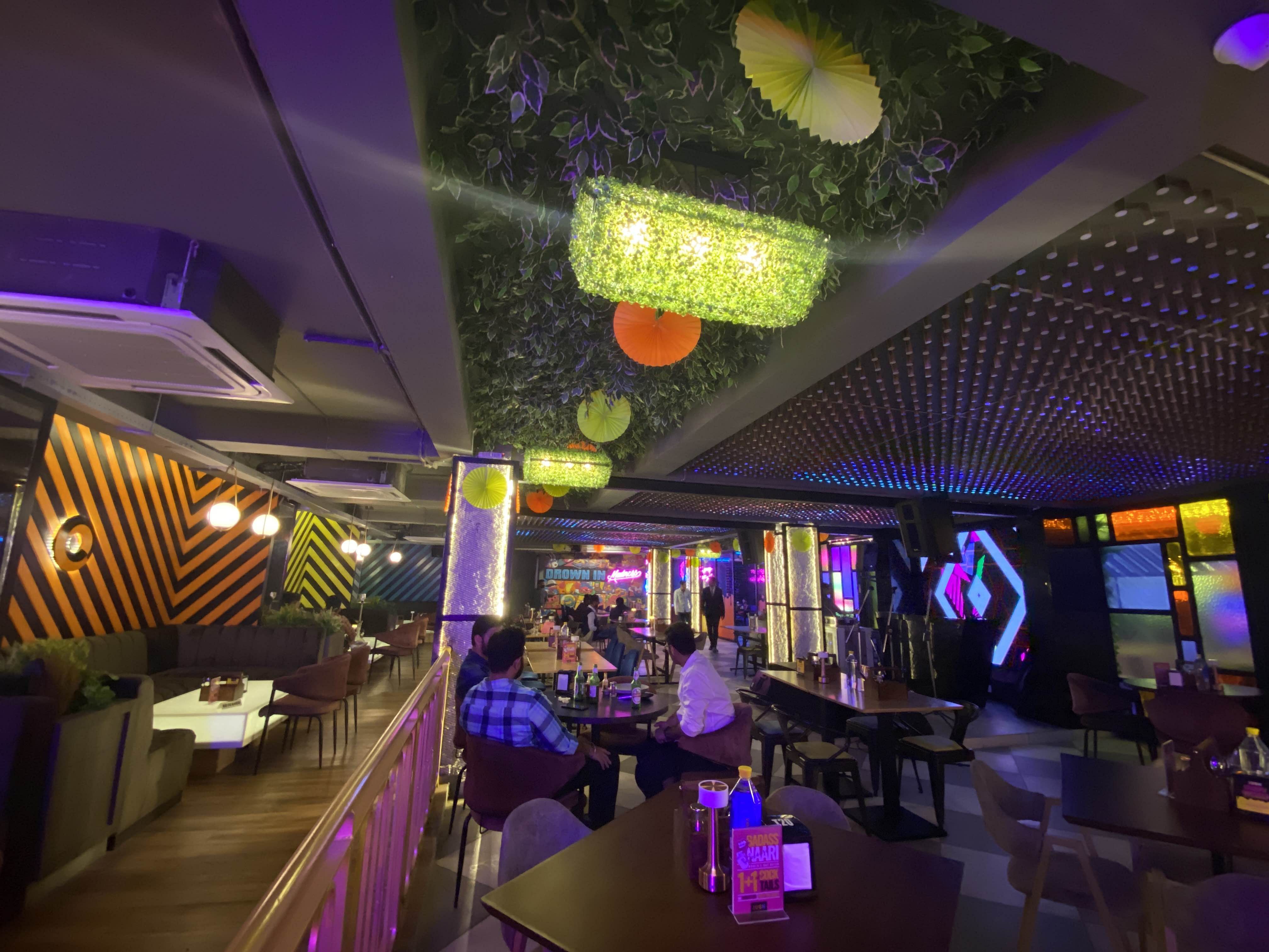 Lighting,Purple,Ceiling,Building,Interior design,Nightclub,Architecture,Restaurant,Leisure,Function hall