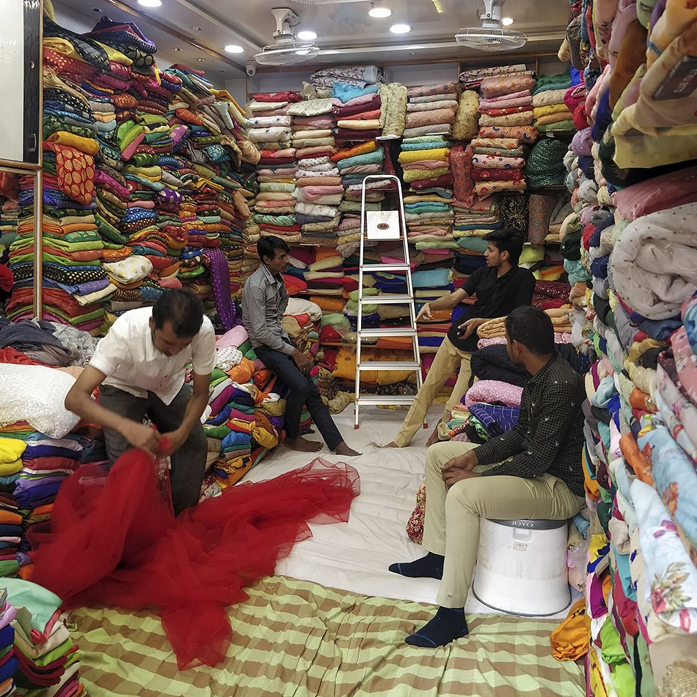 Selling,Marketplace,Bazaar,Market,Public space,Textile,Retail,Convenience store,Trade,Shopping
