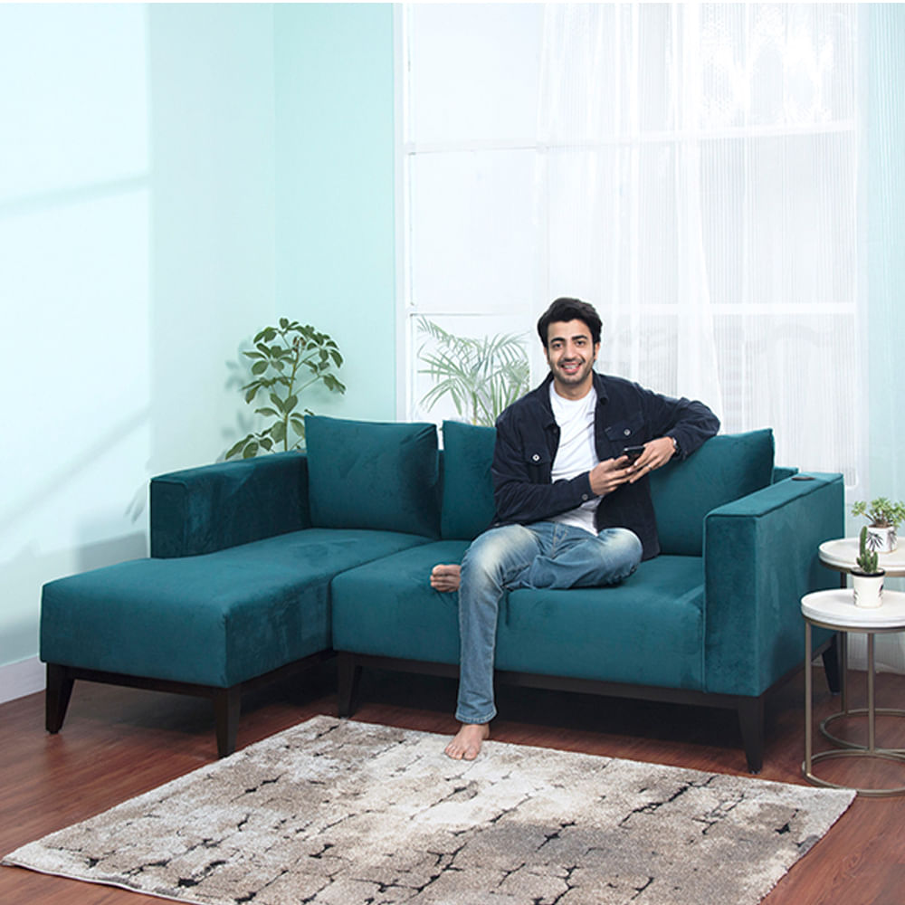 Furniture,Couch,Blue,Turquoise,Sofa bed,Sitting,Room,Living room,Interior design,Comfort