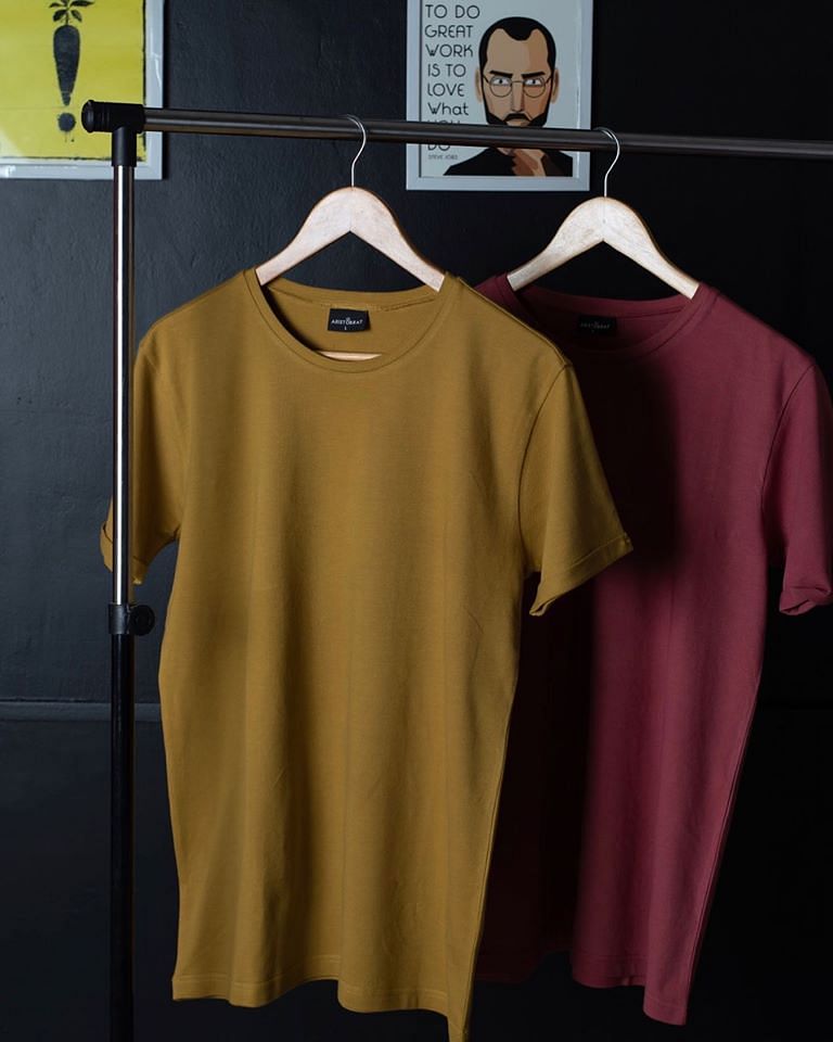 Clothes hanger,Clothing,T-shirt,Yellow,Sleeve,Purple,Fashion,Pink,Top,Outerwear