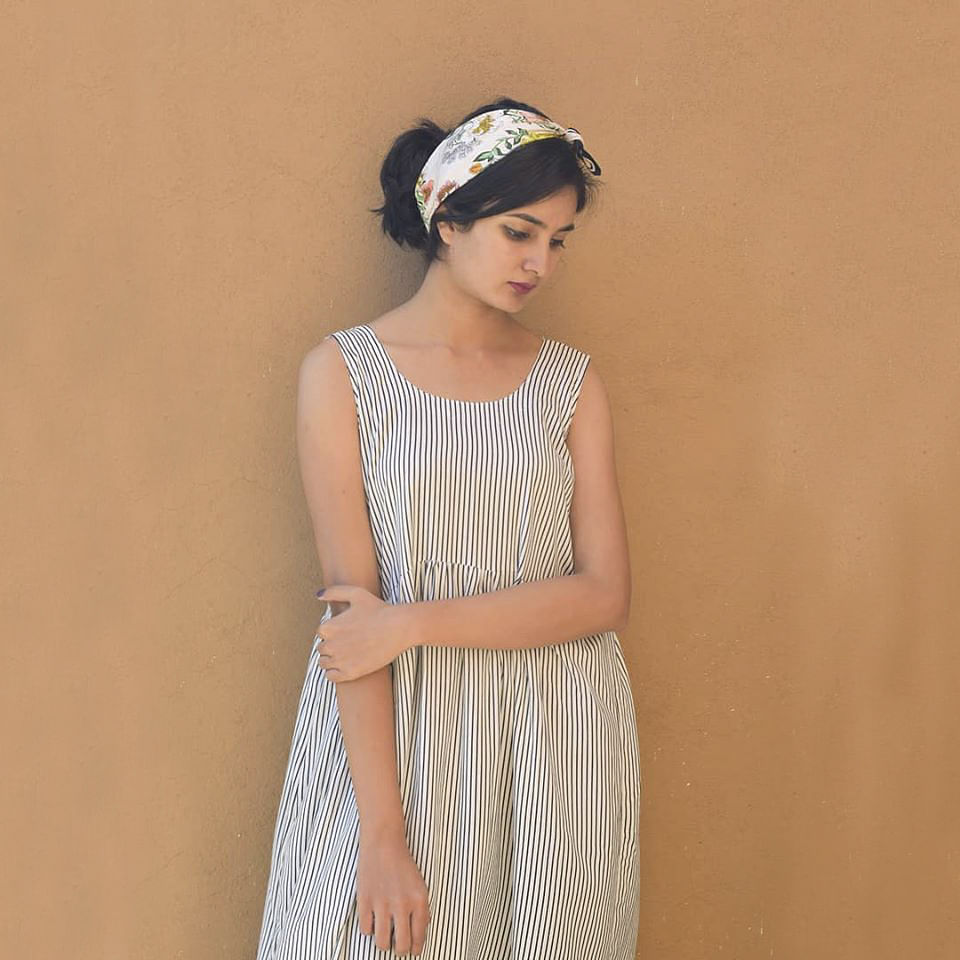 White,Clothing,Dress,Day dress,Waist,Shoulder,Fashion,Neck,Headgear,Hair accessory