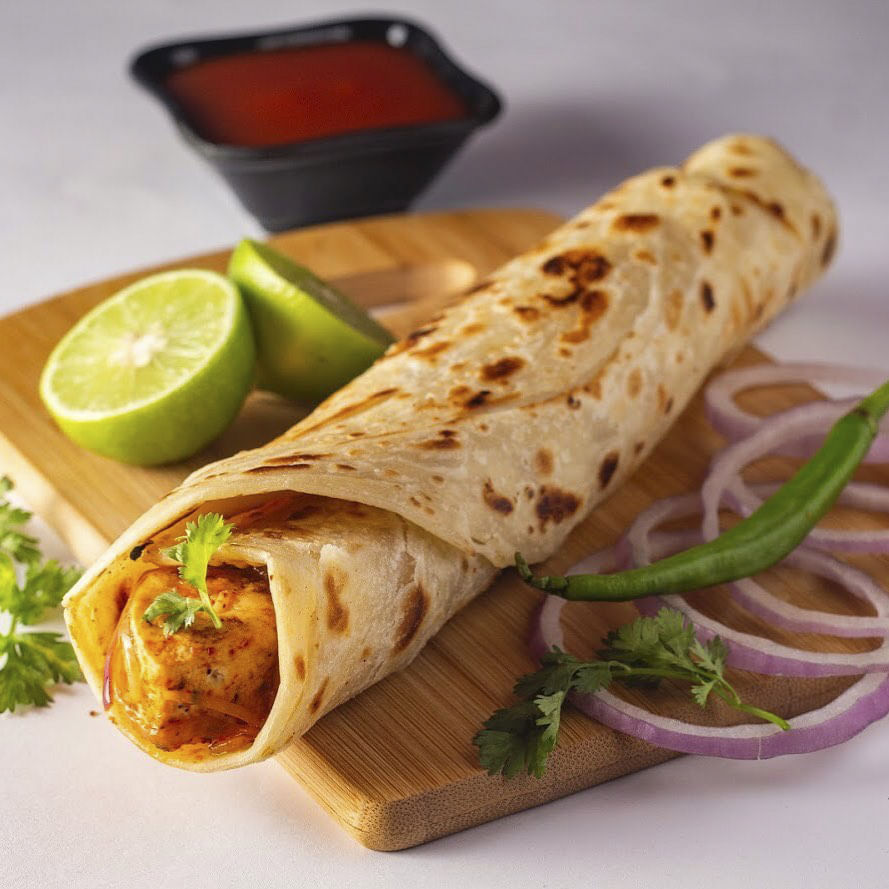 Dish,Food,Cuisine,Kati roll,Sandwich wrap,Ingredient,Wrap roti,Mission burrito,Shawarma,Tortilla