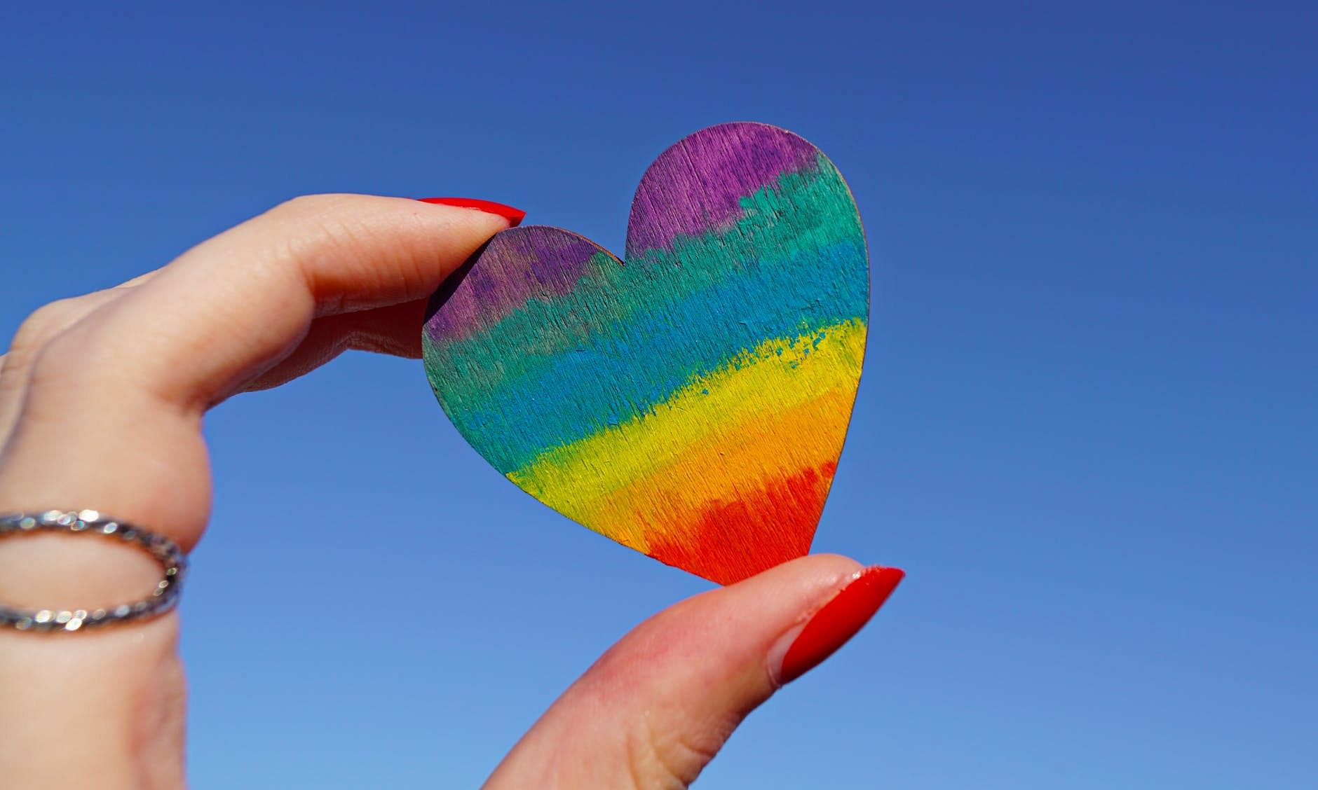 Hand,Heart,Finger,Colorfulness,Sky,Love,Meteorological phenomenon,Thumb