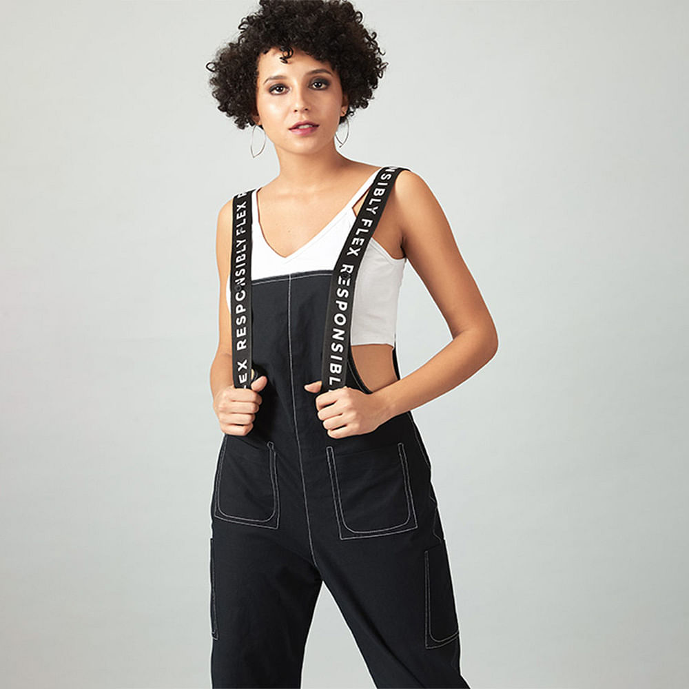 Clothing,White,Black,Waist,Overall,Fashion model,Neck,Shoulder,Fashion,Suspenders