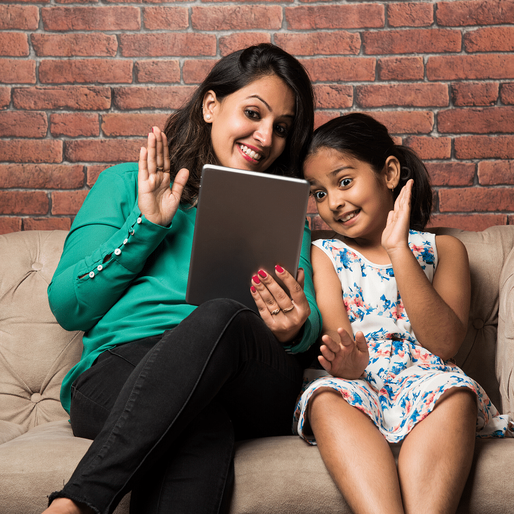 Sitting,Turquoise,Fun,Friendship,Leisure,Technology,Electronic device,Photography,Child,Happy