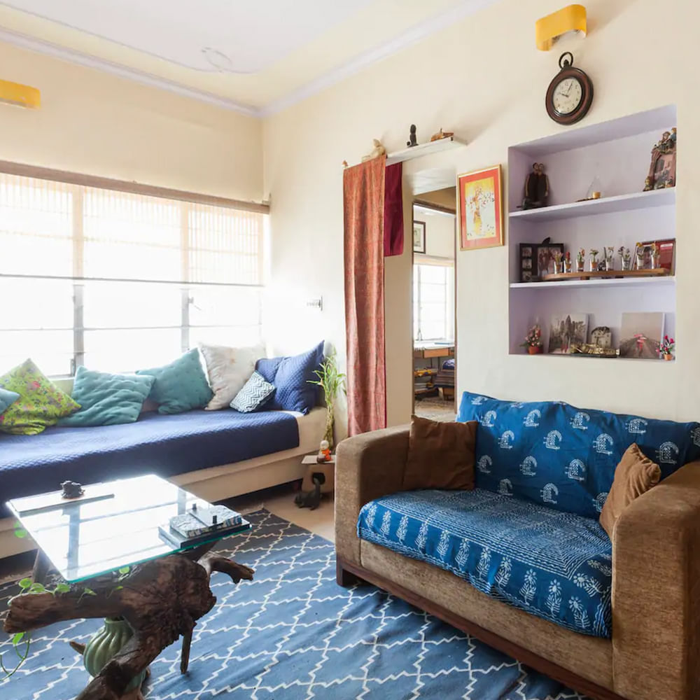 Furniture,Room,Blue,Property,Interior design,Living room,Bed,Floor,Home,House