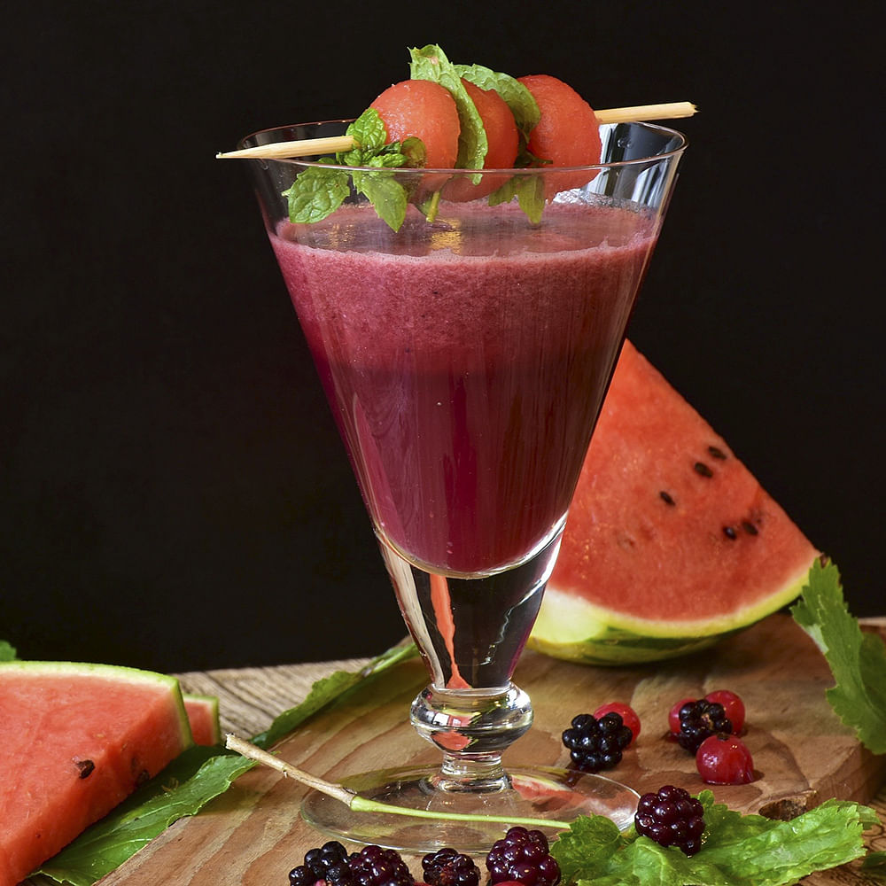 Food,Drink,Juice,Cocktail garnish,Non-alcoholic beverage,Health shake,Blackberry,Smoothie,Ingredient,Vegetable juice