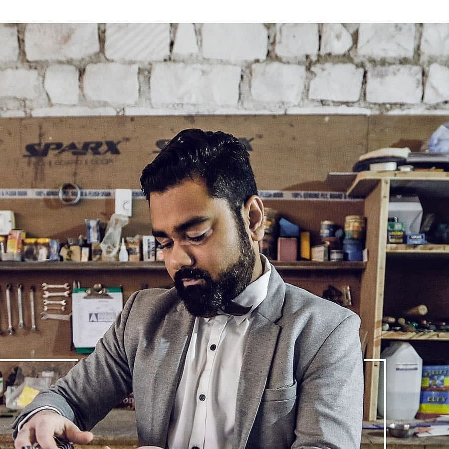 Hair,Cool,Beard,Facial hair,Human,Moustache,Forehead,Shopkeeper,Photography