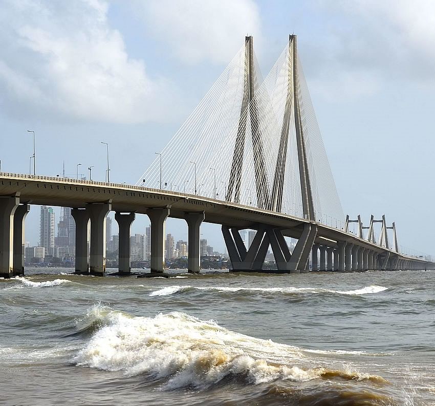 Bridge,Cable-stayed bridge,Skyway,Water,Fixed link,Sea,Nonbuilding structure,River,Sky,Suspension bridge