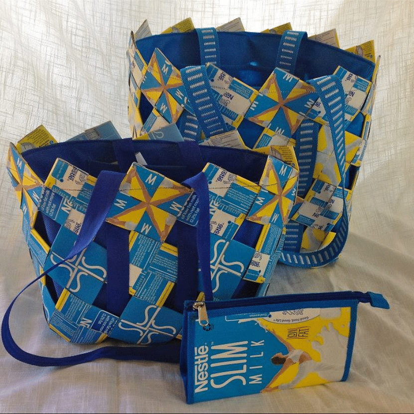 Blue,Yellow,Textile,Paper,Diaper bag,Bag,Art