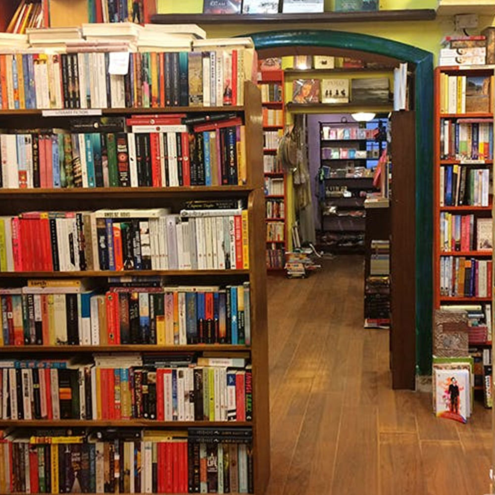 Bookcase,Shelving,Library,Shelf,Public library,Book,Bookselling,Furniture,Publication,Building