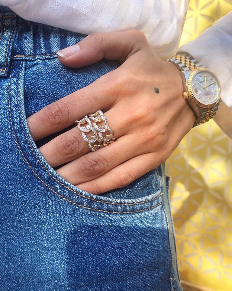 Denim,Jeans,Hand,Finger,Ring,Fashion accessory,Wrist,Arm,Jewellery,Engagement ring