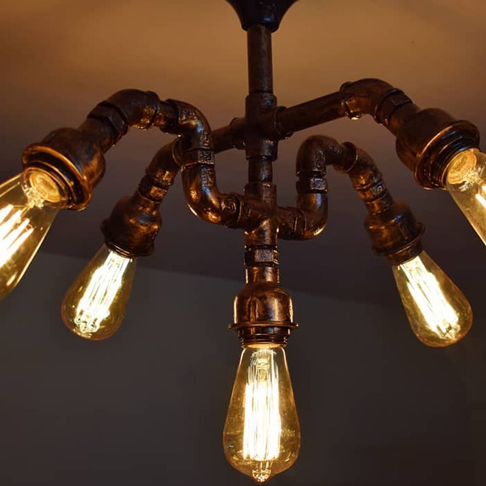 Light fixture,Chandelier,Lighting,Ceiling,Brass,Metal,Bronze,Lighting accessory,Interior design,Incandescent light bulb