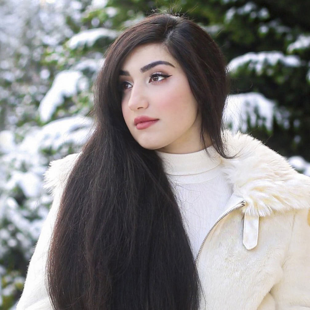 Hair,Face,Lip,White,Fur,Beauty,Hairstyle,Skin,Long hair,Eyebrow