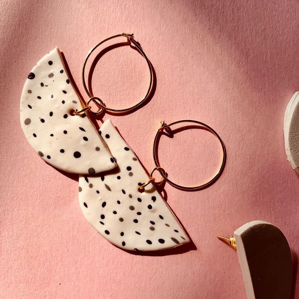 Font,Fashion accessory,Design,Polka dot,Pattern,Metal