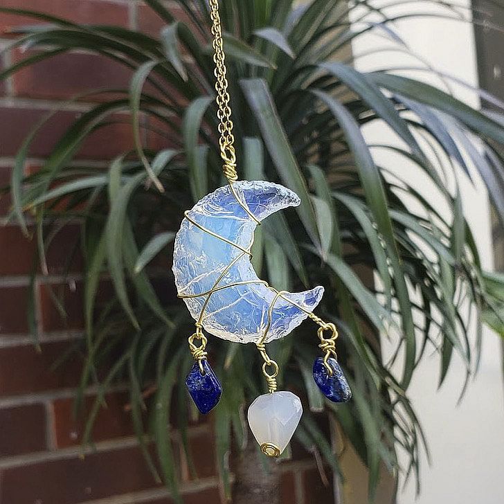 Blue,Cobalt blue,Leaf,Plant,Flower,Fashion accessory,Ornament,Glass,Jewellery,Metal