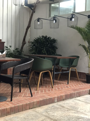 Property,Furniture,Table,Floor,Room,Flooring,Tile,Patio,Chair,Plant