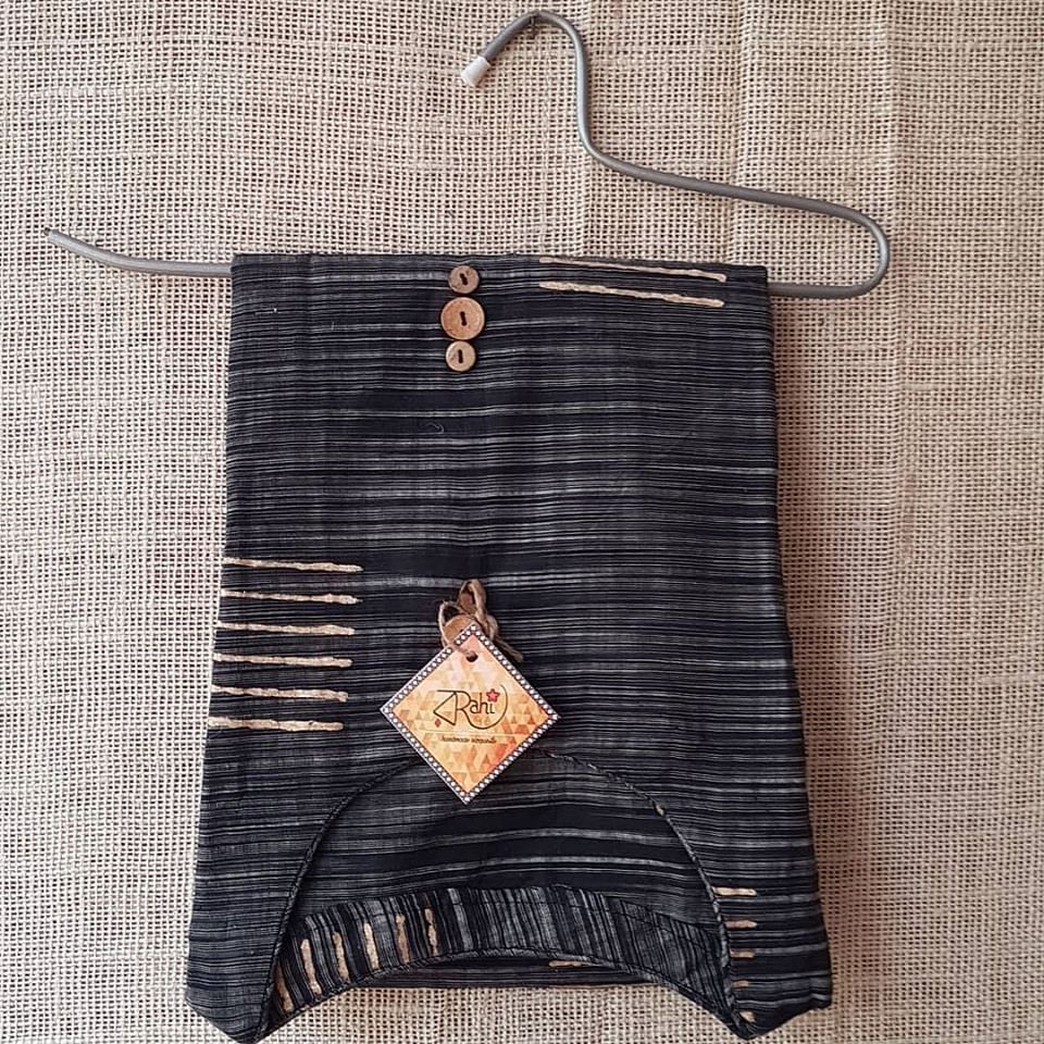 Clothing,Outerwear,Font,Denim,Beige,Jeans,Fashion accessory,Pattern,Pocket,Trousers