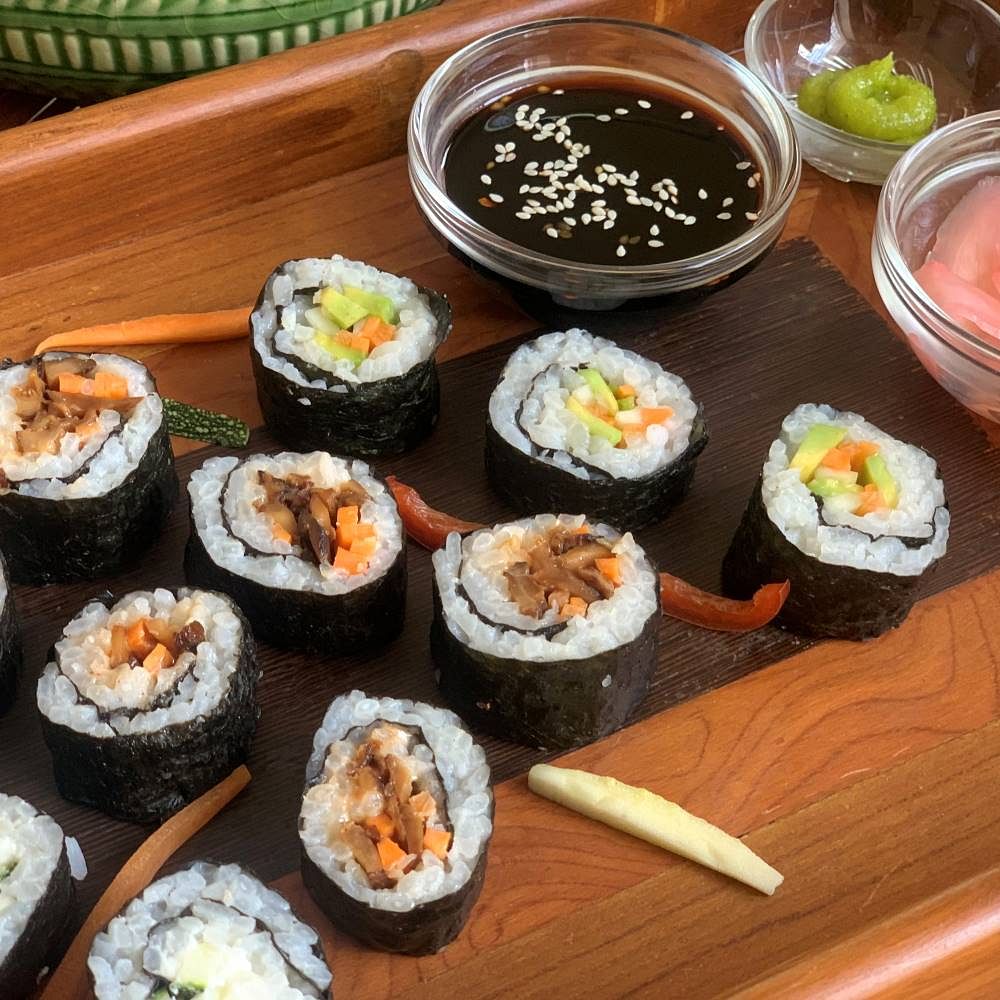 Dish,Gimbap,Food,Cuisine,Sushi,Steamed rice,California roll,Ingredient,Nori,Comfort food