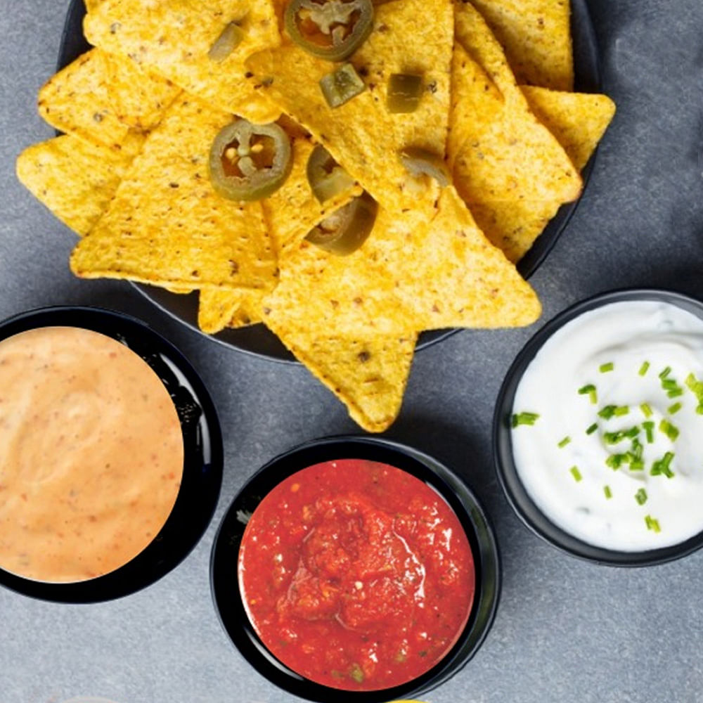 Food,Cuisine,Tortilla chip,Dish,Totopo,Corn chip,Nachos,Ingredient,Dip,Junk food