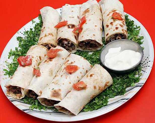 Dish,Food,Cuisine,Ingredient,Sandwich wrap,Burrito,Beyti kebab,Staple food,Produce,Comfort food