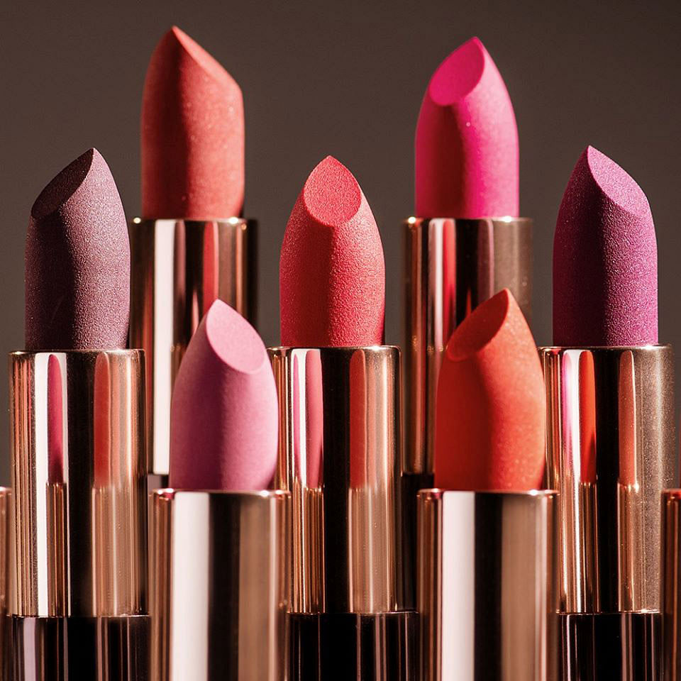 Pink,Lipstick,Cosmetics,Beauty,Lip,Tints and shades,Material property,Magenta,Carmine,Still life photography