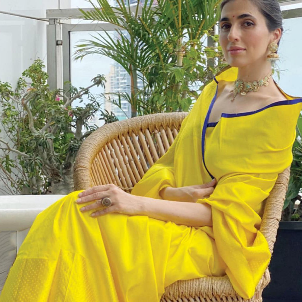 Yellow,Clothing,Dress,Shoulder,Fashion,Sitting,Photo shoot,Textile,Fashion design,Silk