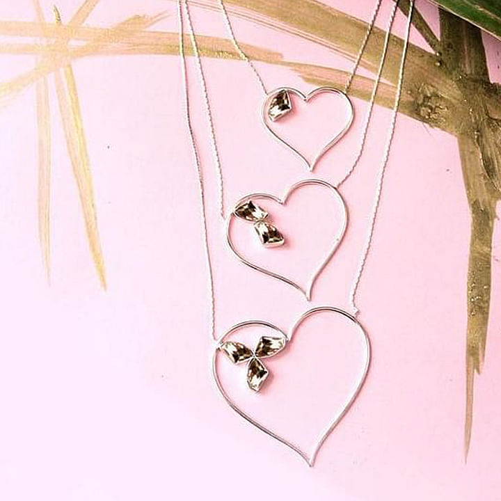 Pink,Heart,Fashion accessory,Jewellery,Leaf,Necklace,Twig,Illustration,Love,Ornament