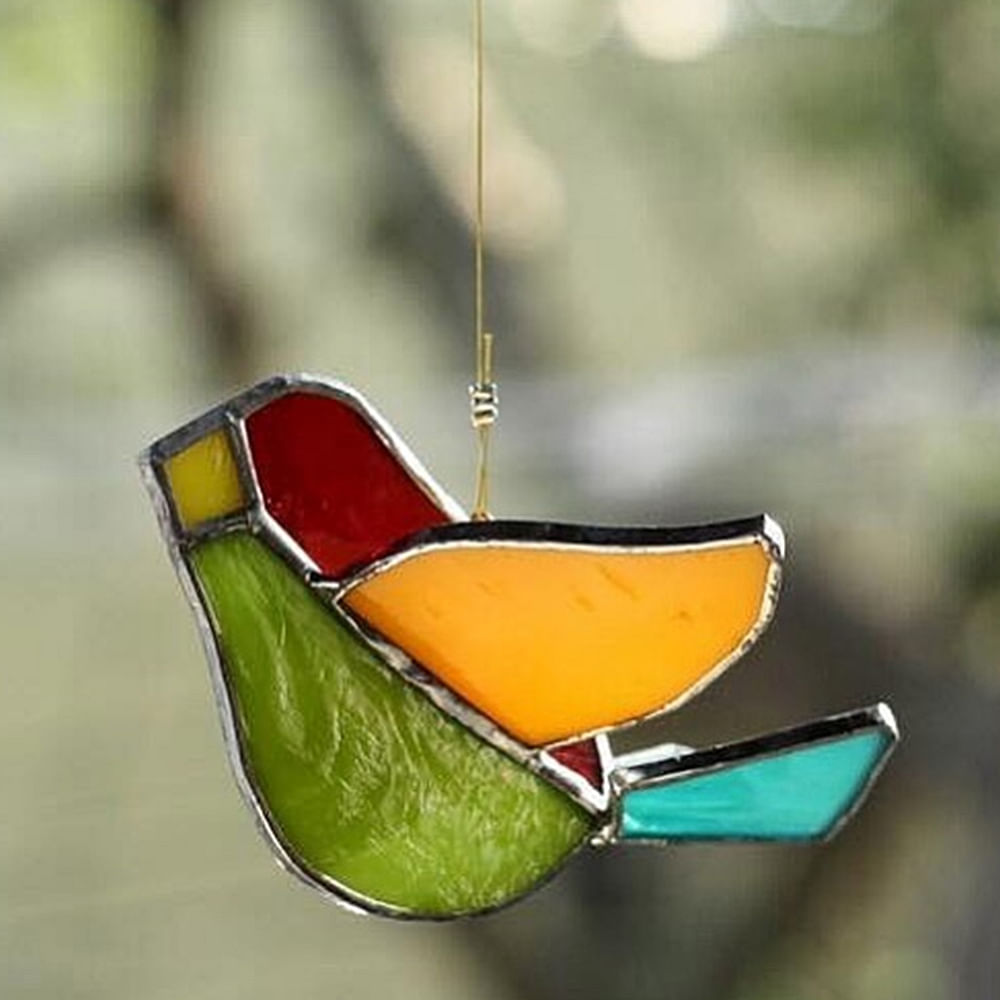 Glass,Leaf,Stained glass,Window,Ornament,Plant,Christmas ornament,Bird feeder,Macro photography