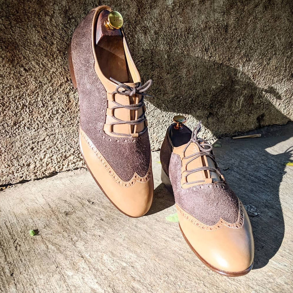 Shoe,Footwear,Beige,Brown,Oxford shoe,Still life photography,Espadrille,Plimsoll shoe,Athletic shoe,Sneakers