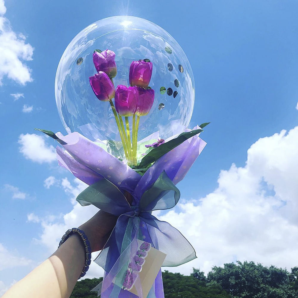 Balloon,Sky,Flower,Lavender,Purple,Plant,Spring,Cloud,Petal,Party supply