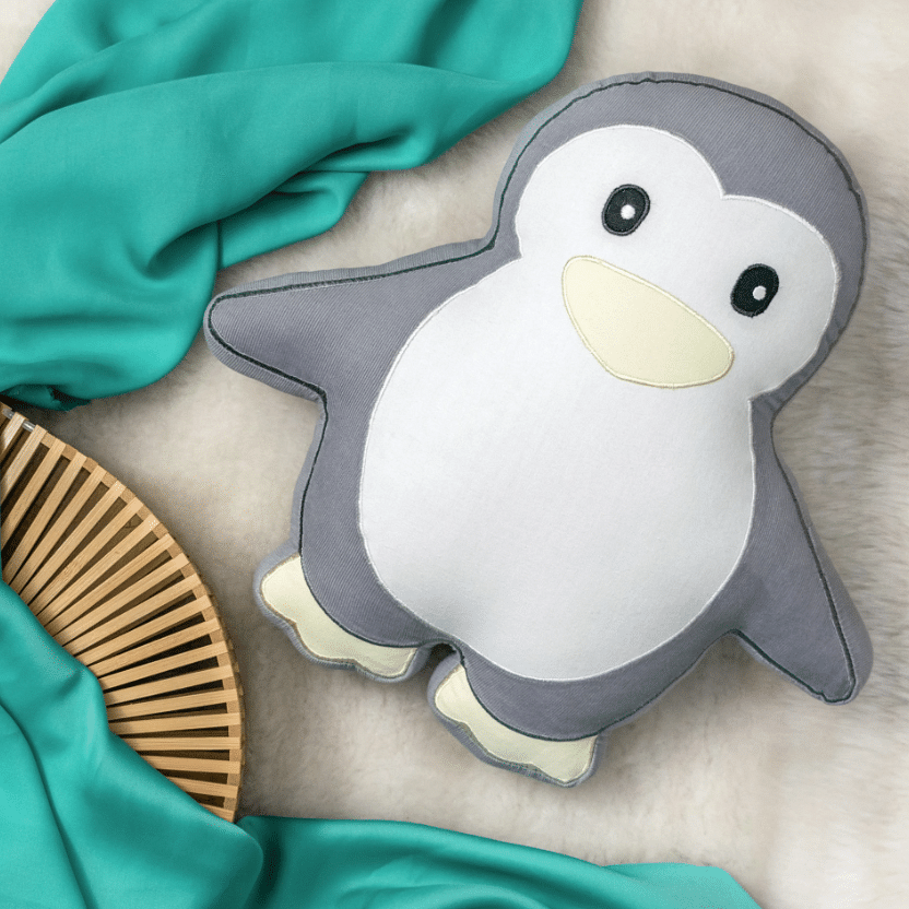 Flightless bird,Penguin,Cartoon,Bird,Marine mammal,Stuffed toy,Animation,Pillow