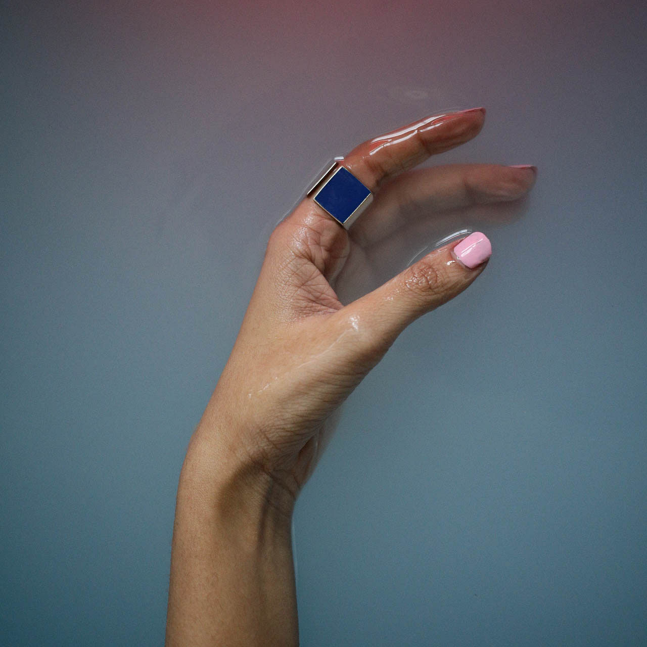 Finger,Hand,Blue,Nail,Skin,Arm,Thumb,Wrist,Gesture,Joint