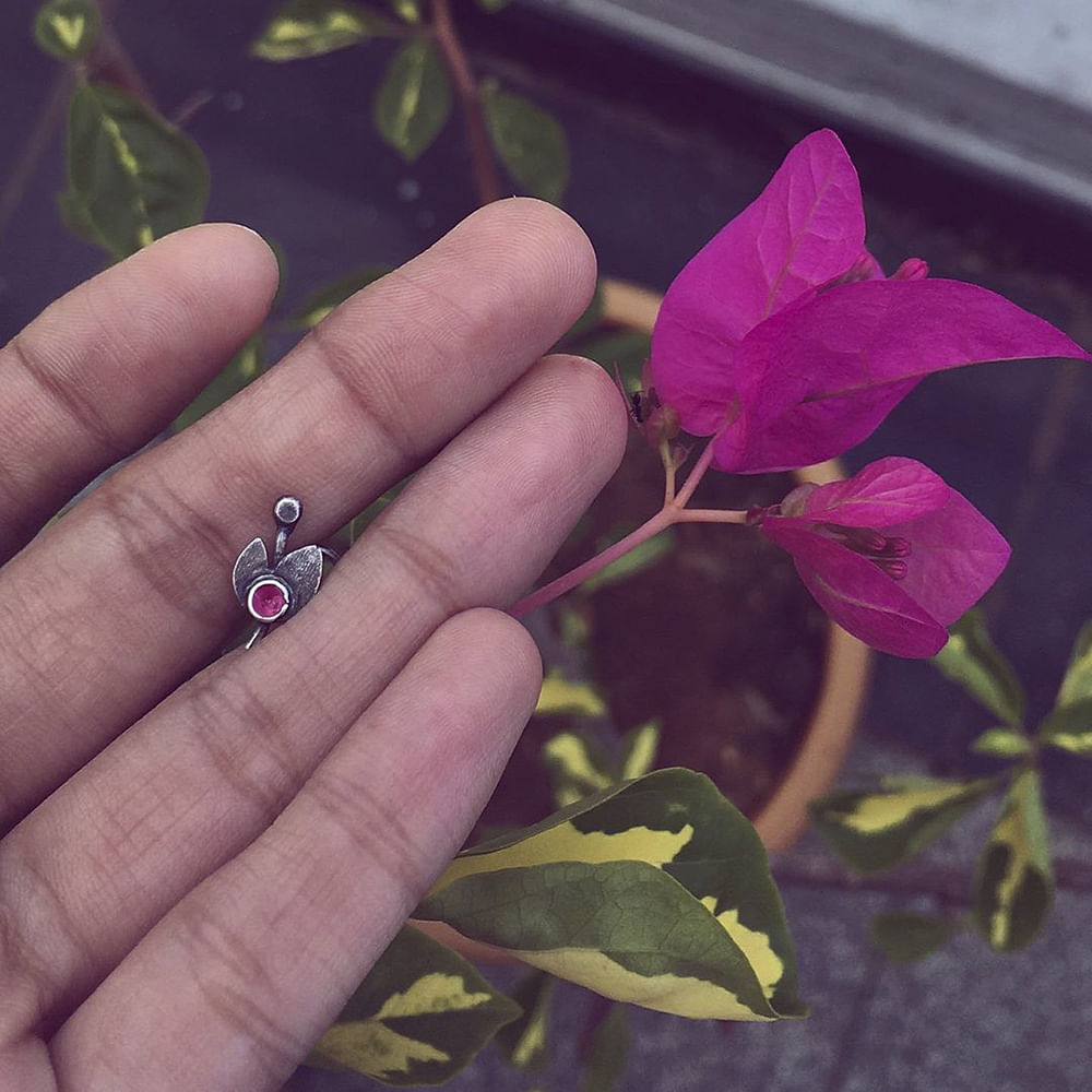 Flower,Finger,Plant,Hand,Petal,Purple,Pink,Leaf,Flowering plant,Nail