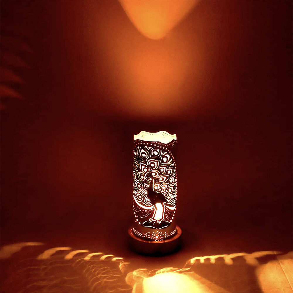 Lighting,Light,Sky,Nightlight,Light fixture,Facial hair,Lighting accessory,Font,Lamp,Still life photography