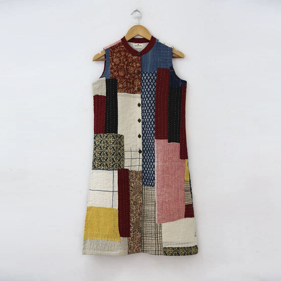 Clothing,Outerwear,Maroon,Patchwork,Brown,Textile,Pattern,Woven fabric,Sleeve,Beige