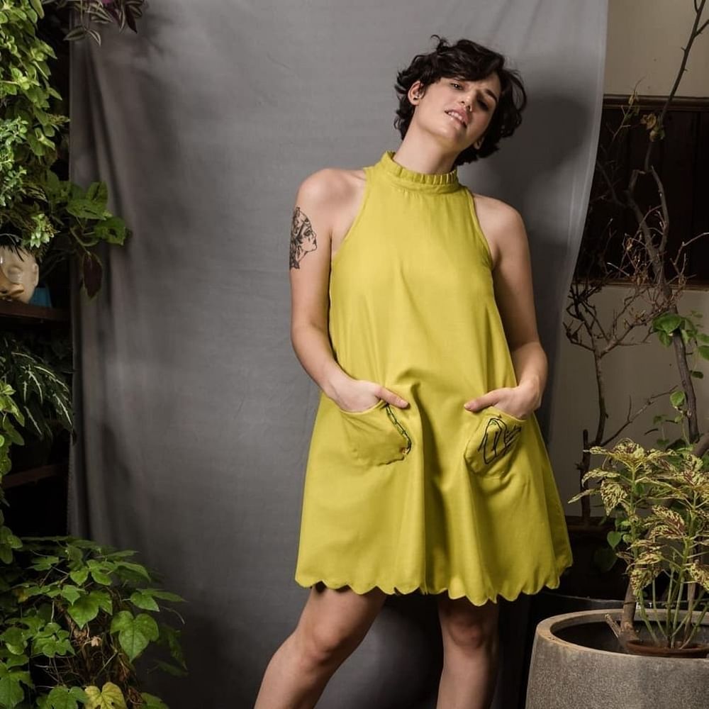 Clothing,Fashion model,Dress,Yellow,Green,Fashion,Day dress,Shoulder,Cocktail dress,Waist