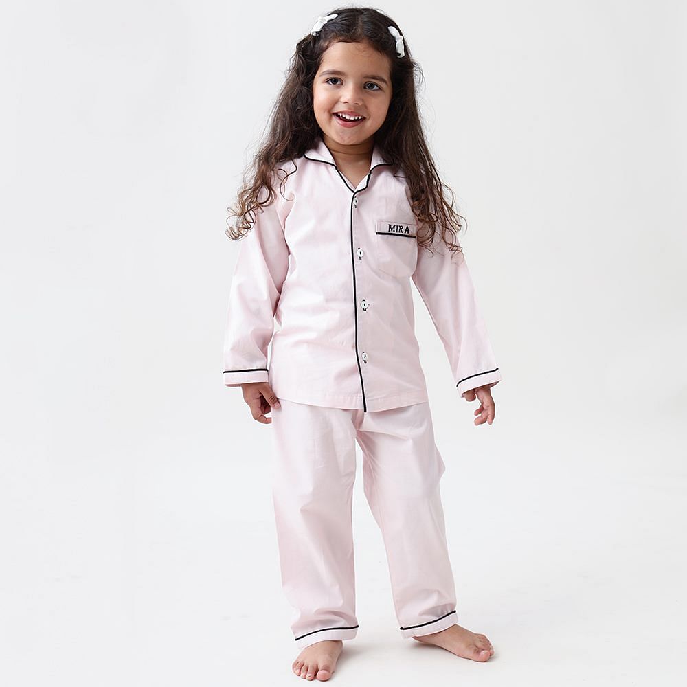 Clothing,White,Nightwear,Uniform,Pajamas,Outerwear,Robe,Suit,Sleeve,Child