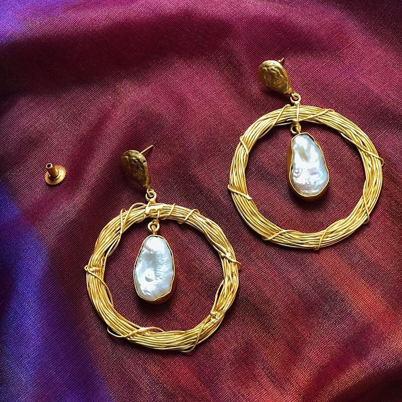 Earrings,Jewellery,Body jewelry,Fashion accessory,Pearl,Gold,Metal,Gemstone,Circle,Magenta