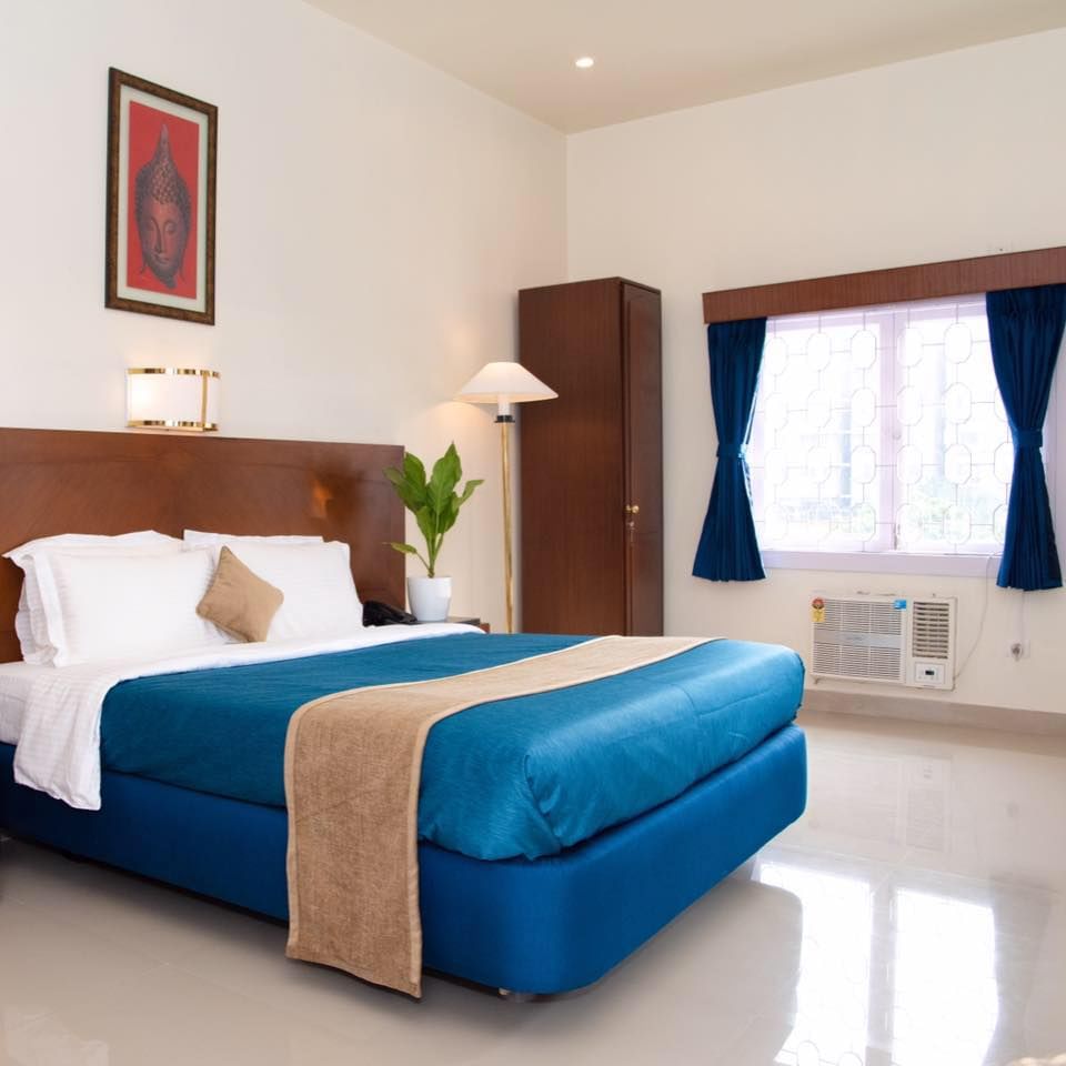 Bedroom,Bed,Furniture,Mattress,Room,Bed sheet,Property,Interior design,Bed frame,Bedding