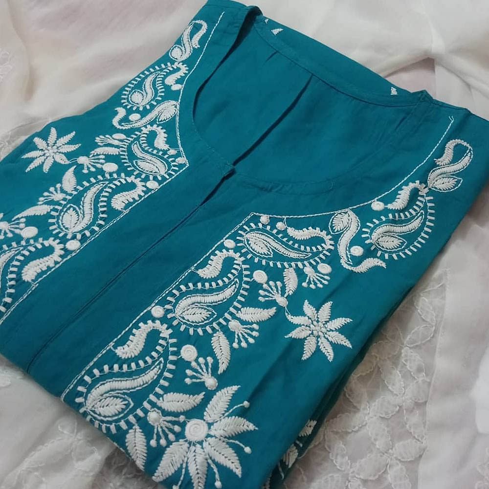 Aqua,Blue,Turquoise,Clothing,Teal,Pattern,Textile,Visual arts,Motif,Design